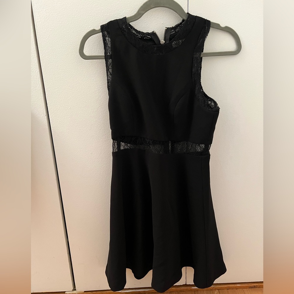 BCBGeneration size 0 black dress with lace accents